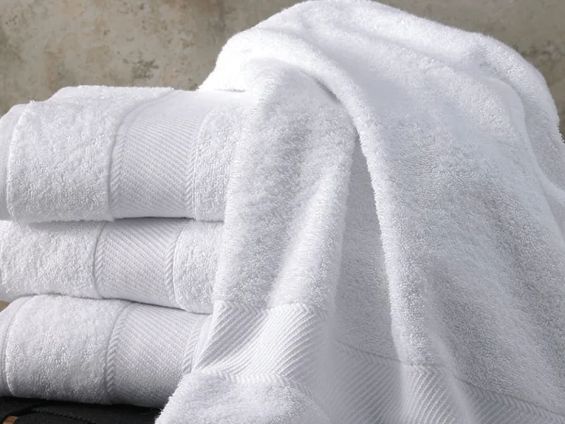 Stack of white cotton hotel bath towels